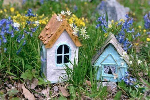 real estate spring market - little fairy houses in the garden